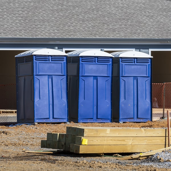 what is the cost difference between standard and deluxe portable toilet rentals in Edwardsville